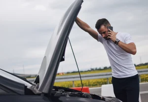 Battery Boost 5 stranded driver waiting for tow truck to arrive